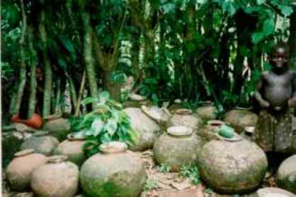 Boy and Water Storage Pots